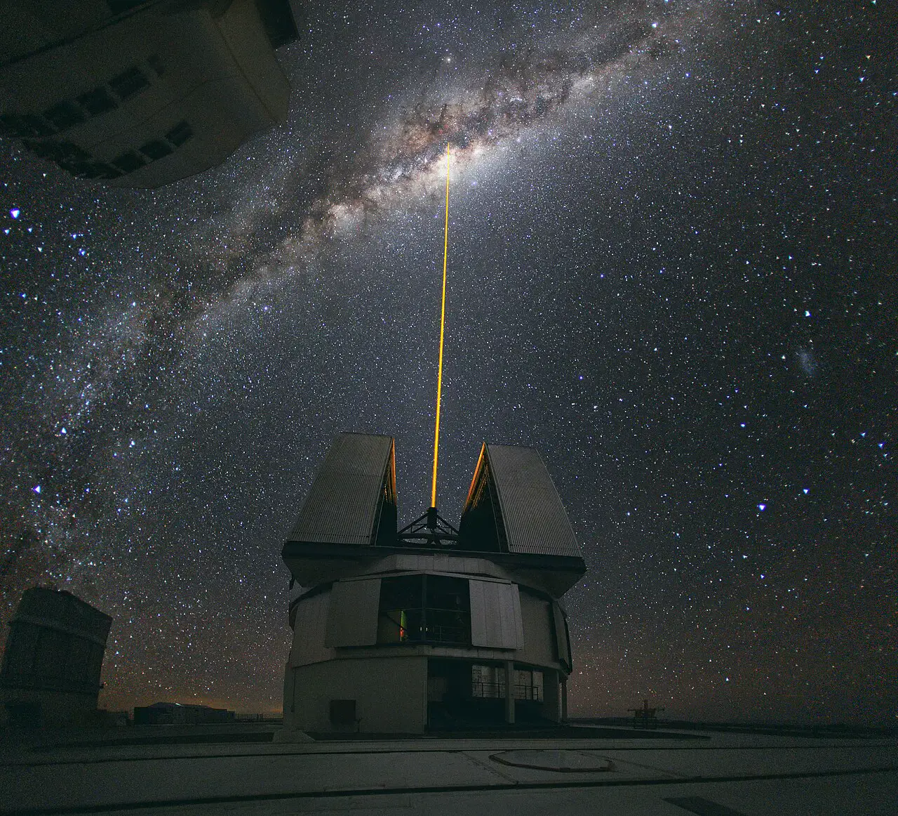 The Milky Way over the Very Large Telescope at Paranal, with a laser guide star aimed at the galactic centre