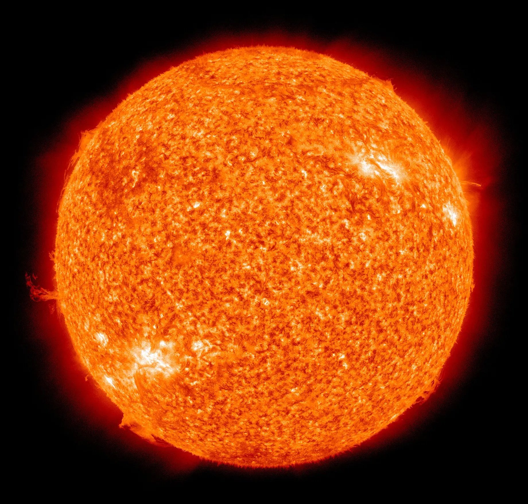 The Sun in ultraviolet light, imaged by NASA's Solar Dynamics Observatory, showing loops and eruptions above its surface